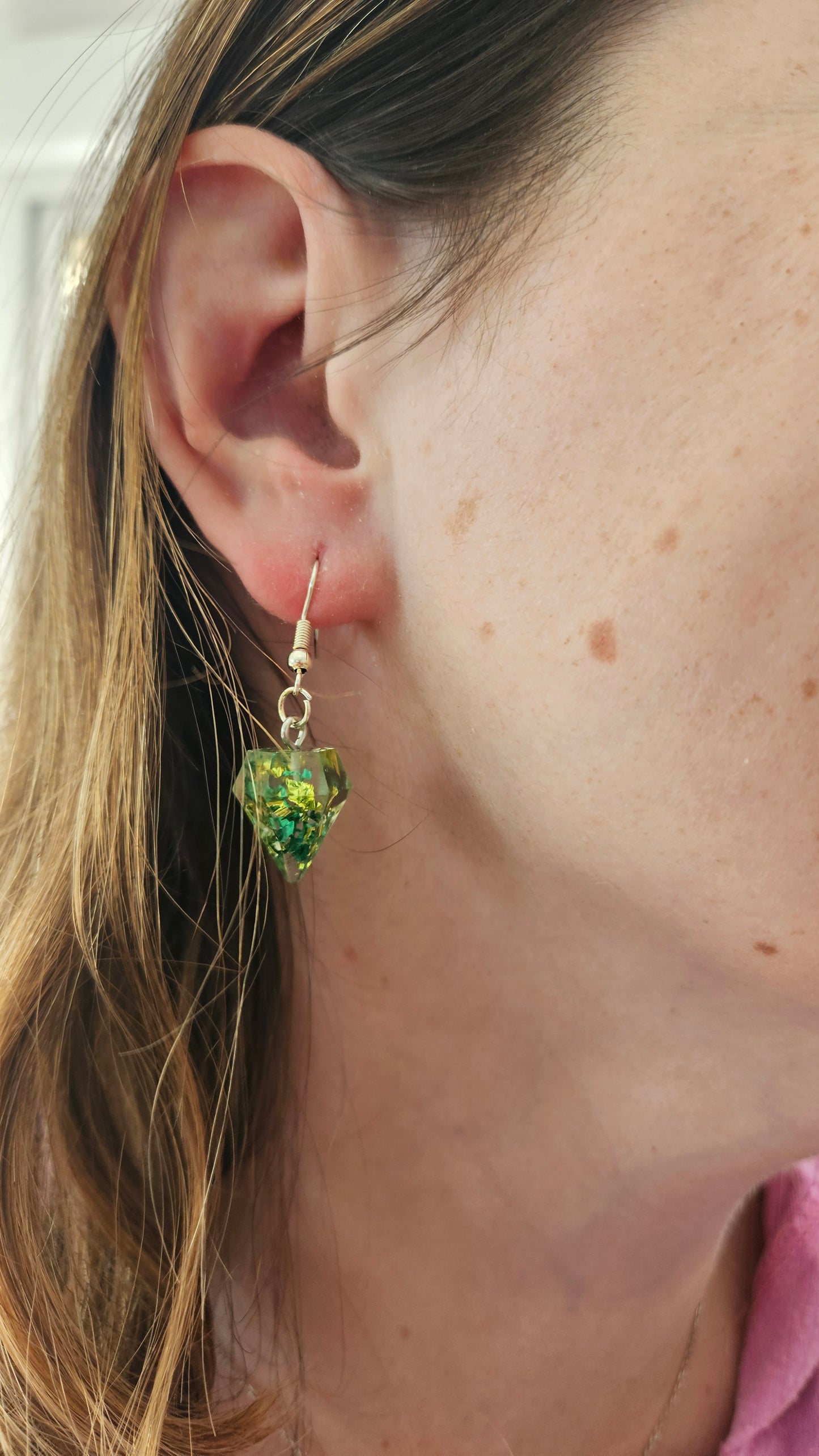 Boucle d'oreille en forme de diamant