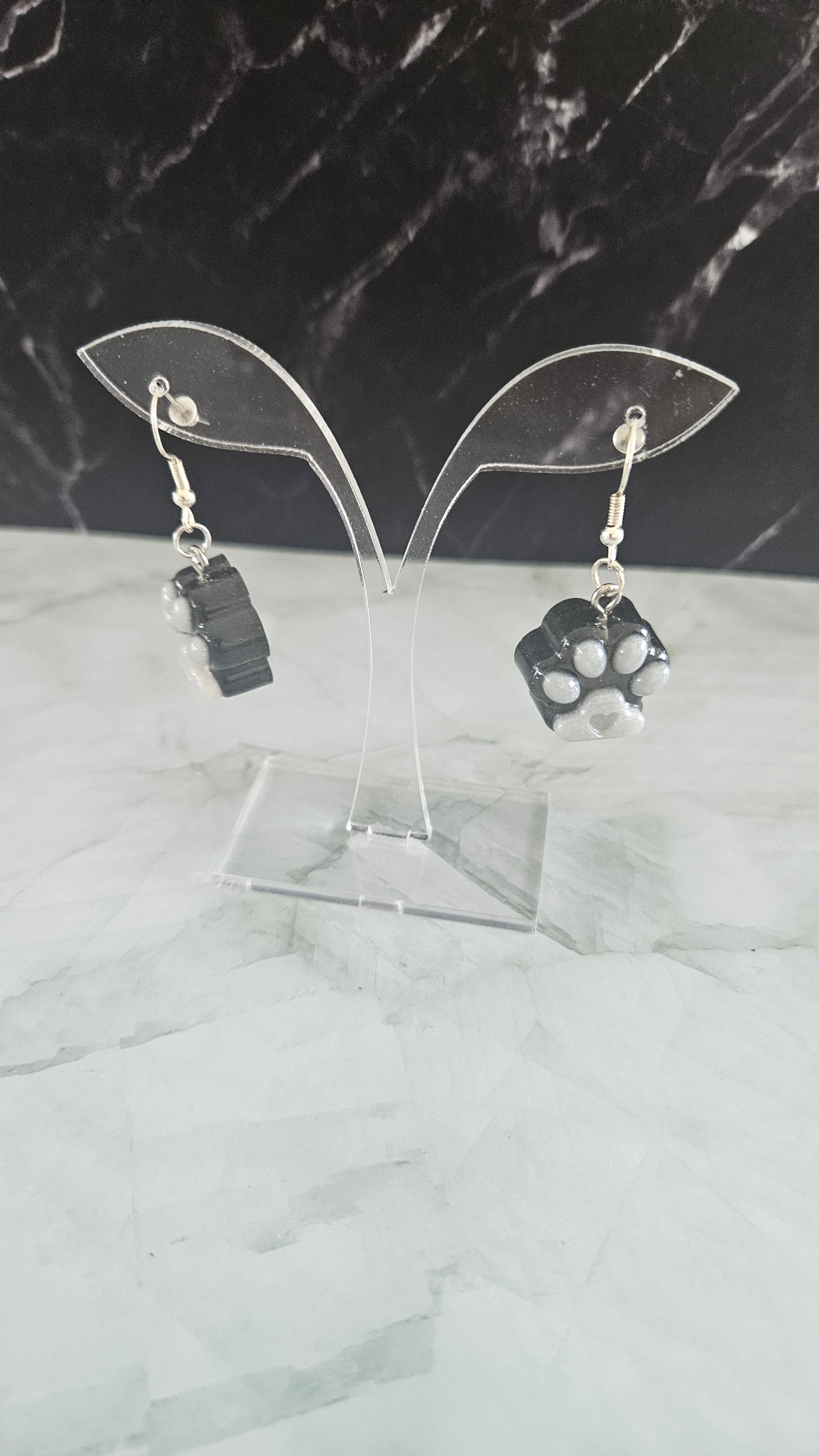 Boucle d'oreille en forme de patte